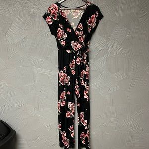 Women’s black floral jumpsuit.